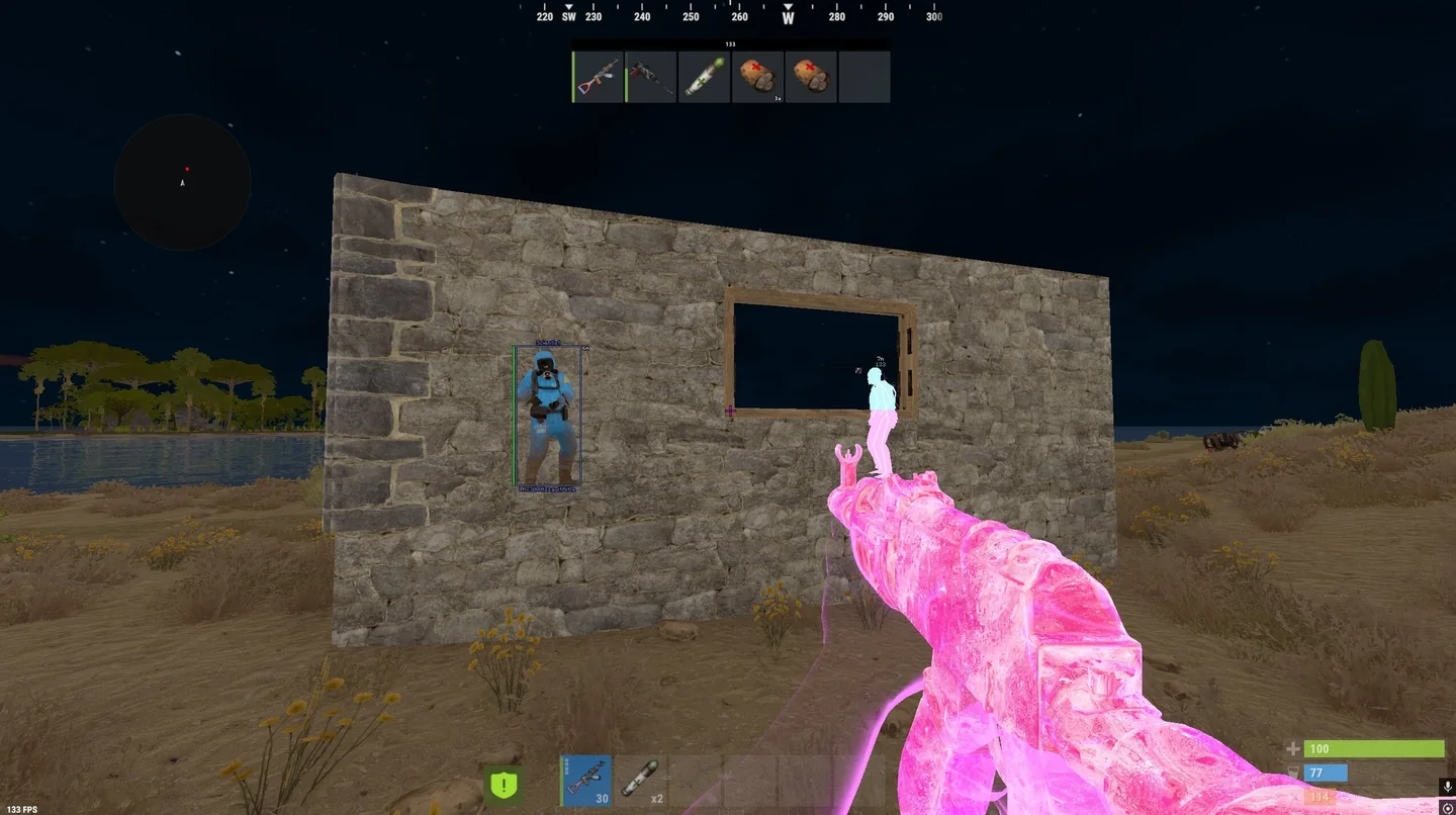 Rust wallhack and player chams highlighting opponents around a stone base